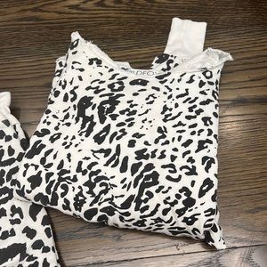 Wild fox set. Black and white cheetah. Top is W XS bottoms are girls XL